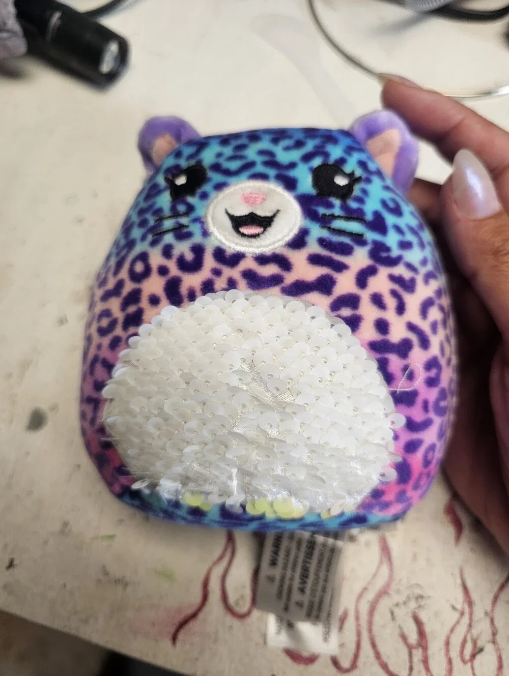Colorful Leopard-Print Plush Cat with Iridescent Sequin Belly Squishmallow